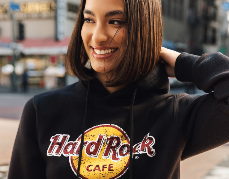 woman wearing black Hard Rock Cafe sweater